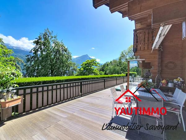 Chalet madrier sur le coteau de l’Éponnet avec vue panoramique sur les Alpes