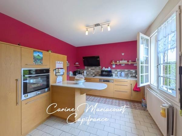 Maison de 107 m2 - 3 chambres - sous-sol intégral semi-enterré