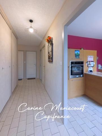 Maison de 107 m2 - 3 chambres - sous-sol intégral semi-enterré