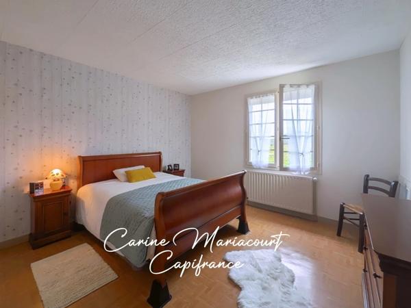 Maison de 107 m2 - 3 chambres - sous-sol intégral semi-enterré