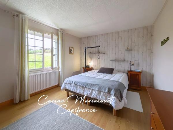 Maison de 107 m2 - 3 chambres - sous-sol intégral semi-enterré