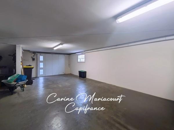 Maison de 107 m2 - 3 chambres - sous-sol intégral semi-enterré