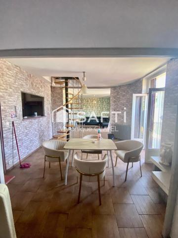 Immeuble de 150m2 avec grand garage et balcon