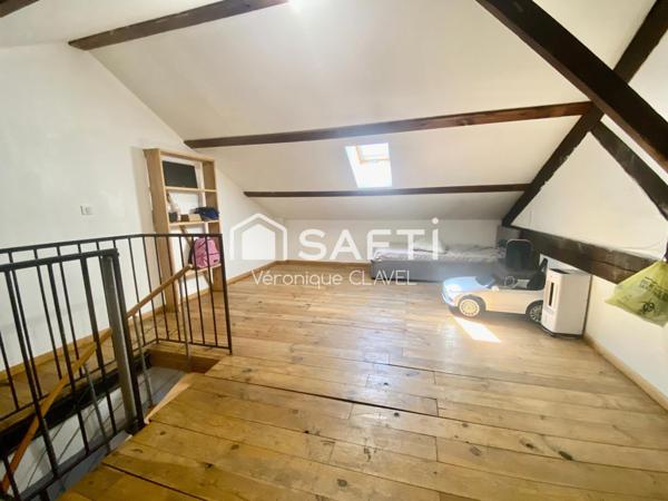 Immeuble de 150m2 avec grand garage et balcon