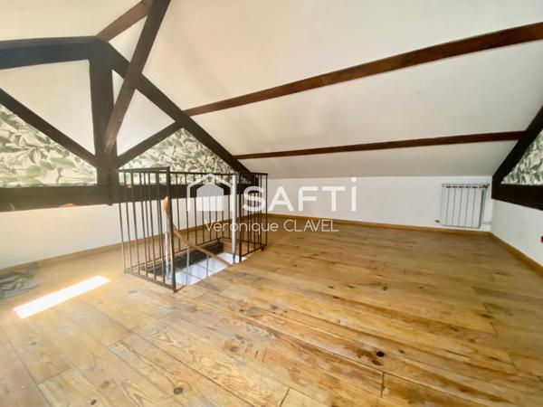 Immeuble de 150m2 avec grand garage et balcon