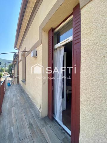 Immeuble de 150m2 avec grand garage et balcon