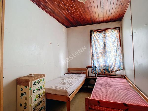 COPPONEX _ Ferme mitoyenne à rénover avec jardin et garage