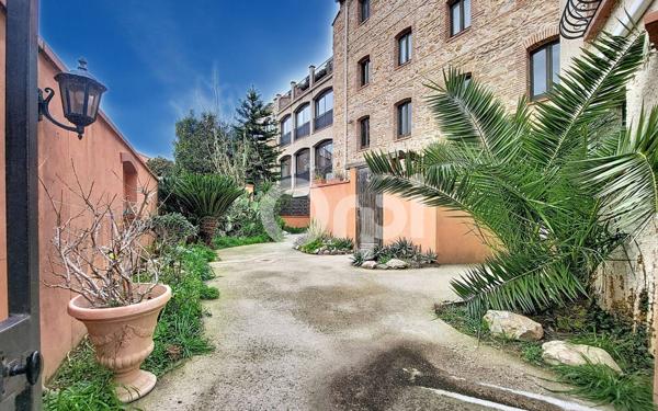 Immeuble à vendre    14 pièces •  Thuir