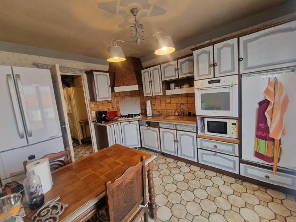 Maison 132m2 avec sous-sol complet, garage et jardin