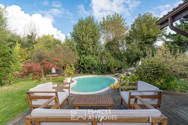 Maison familiale chaleureuse et son jardin intimiste