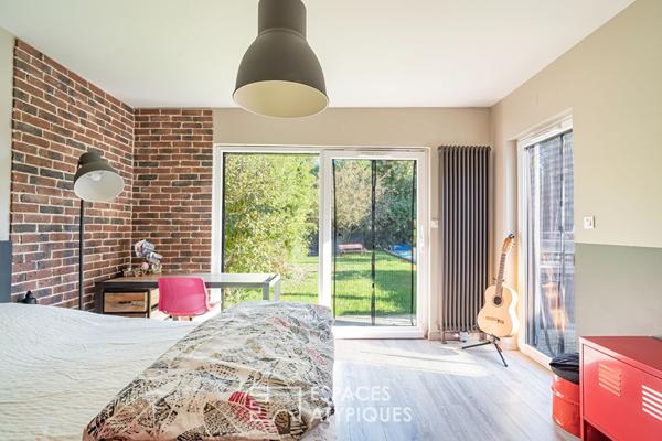 Maison familiale chaleureuse et son jardin intimiste