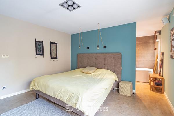 Maison familiale chaleureuse et son jardin intimiste