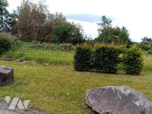 sortie Pouxeux direction Arches , parcelle de terrain de 7759 m²
partie zone UA 
partie zone N