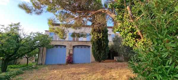 Spacieuse maison avec atelier de 220 m², terrasses, garages et jardin de 600m²