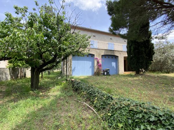 Spacieuse maison avec atelier de 220 m², terrasses, garages et jardin de 600m²