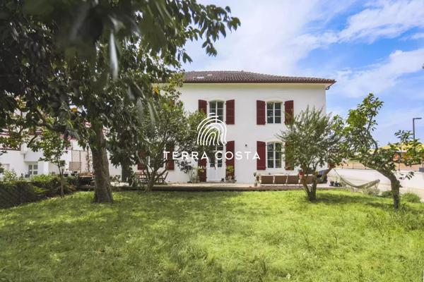 Duplex de 148 m² – Esprit maison – Jardin privatif de + 500 m²