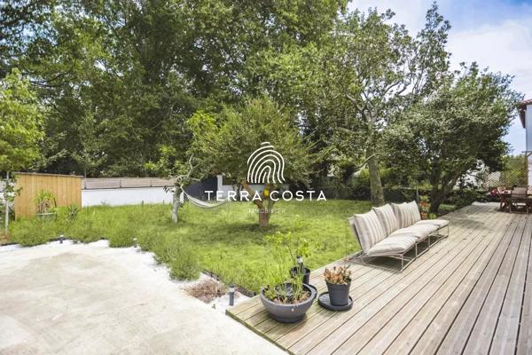 Duplex de 148 m² – Esprit maison – Jardin privatif de + 500 m²