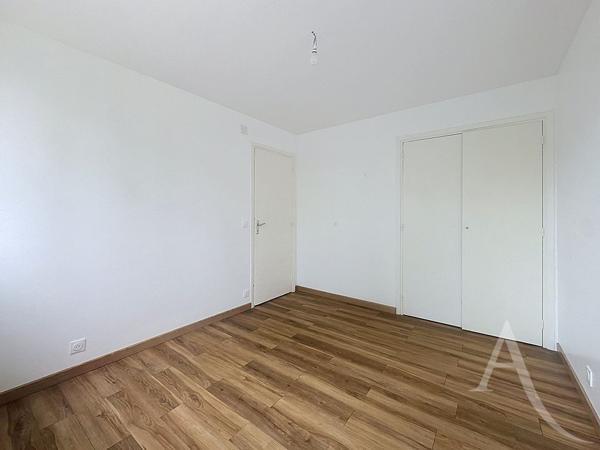 EXCLUSIVITÉ - Appartement F3 56 m² avec balcon, 2 chambres, cave et cuisine équipée