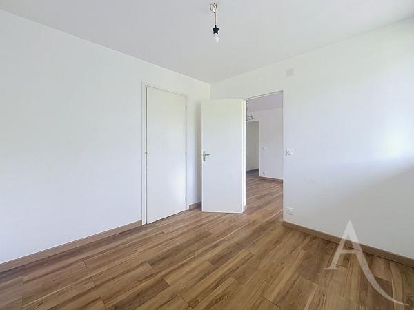 EXCLUSIVITÉ - Appartement F3 56 m² avec balcon, 2 chambres, cave et cuisine équipée