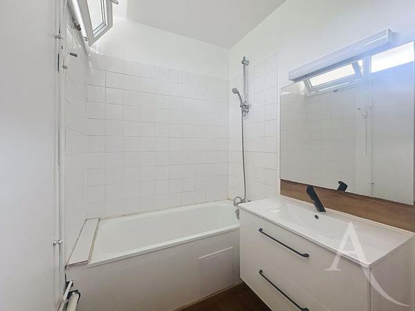 EXCLUSIVITÉ - Appartement F3 56 m² avec balcon, 2 chambres, cave et cuisine équipée