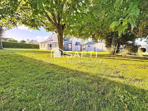Maison 4 chambres avec véranda, buanderie, garage, hangar et serre