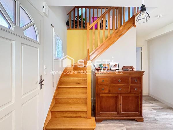 Maison 4 chambres avec véranda, buanderie, garage, hangar et serre