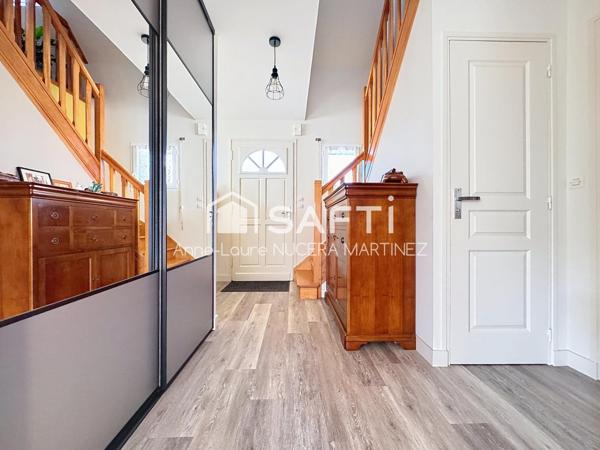 Maison 4 chambres avec véranda, buanderie, garage, hangar et serre