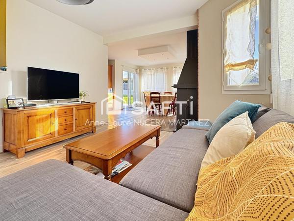 Maison 4 chambres avec véranda, buanderie, garage, hangar et serre