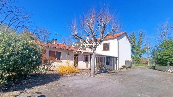 Maison familiale de 170 m² avec jardin et garages