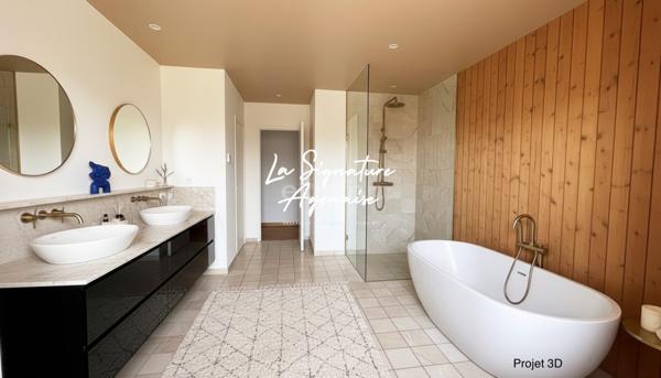 Maison familiale de 170 m² avec jardin et garages