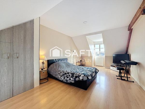 Maison familiale idéalement située dans Neuville aux Bois avec sous-sol total