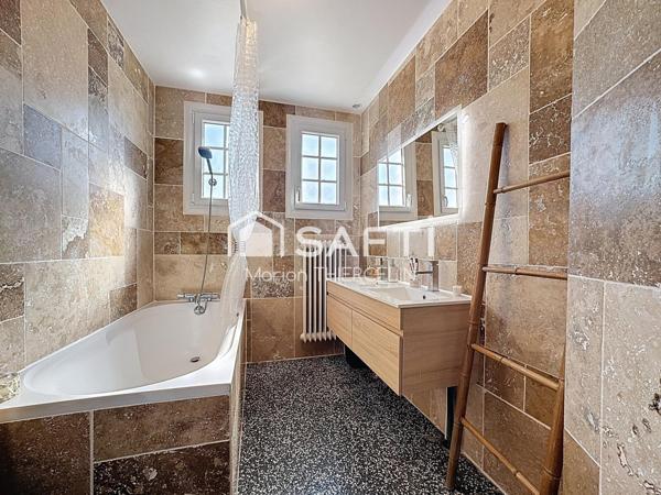 Maison familiale idéalement située dans Neuville aux Bois avec sous-sol total