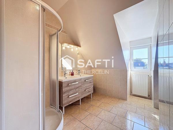 Maison familiale idéalement située dans Neuville aux Bois avec sous-sol total