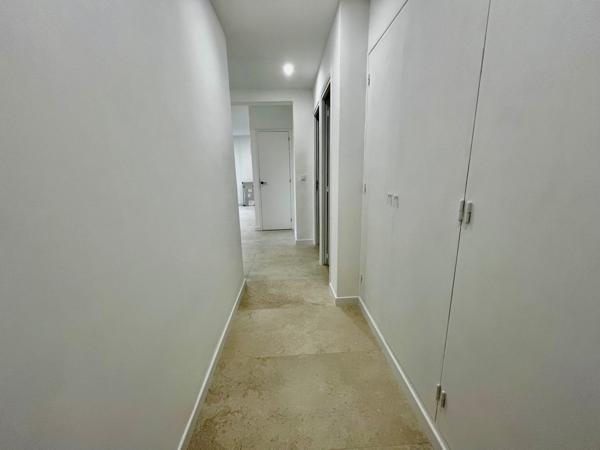 T4 rénové de 84 m² avec balcon filant, ascenseur et parking