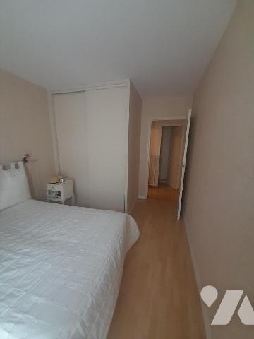 Appartement T2 avec balcon, cellier, et emplacement de parking fermé