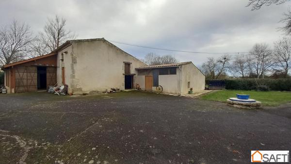 Parcelle 1ha18 maison semi-enterrée 90m2 , dépendances agricoles
