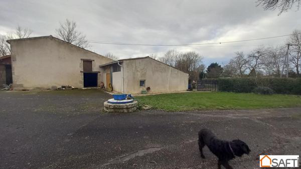 Parcelle 1ha18 maison semi-enterrée 90m2 , dépendances agricoles