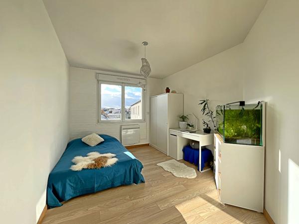 Appartement familial 5 pièces lumineux avec balcon, garage et grenier - Reims Courlancy