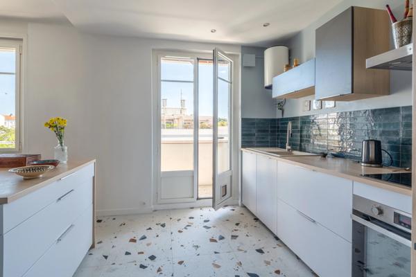 Lyon 4ème - Appartement de 103,54 m² - 3 chambres - Balcon filant - garage