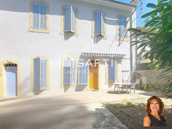 Maison de ville avec extérieur, stationnement et dépendance indépendante en plein centre ville!
