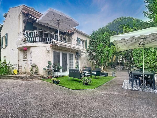Bâtisse de 2 logements + parcelle de terrain constructible