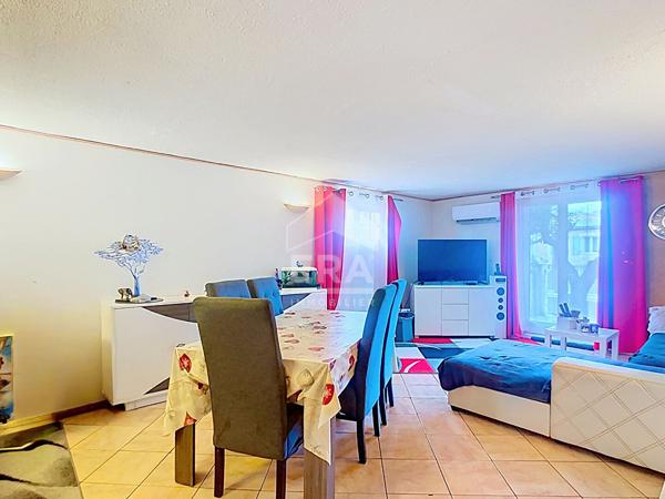 Bâtisse de 2 logements + parcelle de terrain constructible