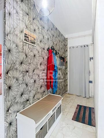 Bâtisse de 2 logements + parcelle de terrain constructible