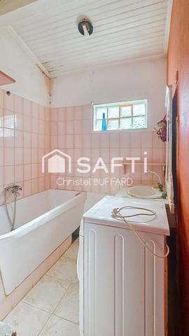 Petit immeuble à fort potentiel avec terrain constructible