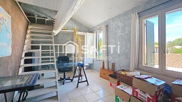 Petit immeuble à fort potentiel avec terrain constructible