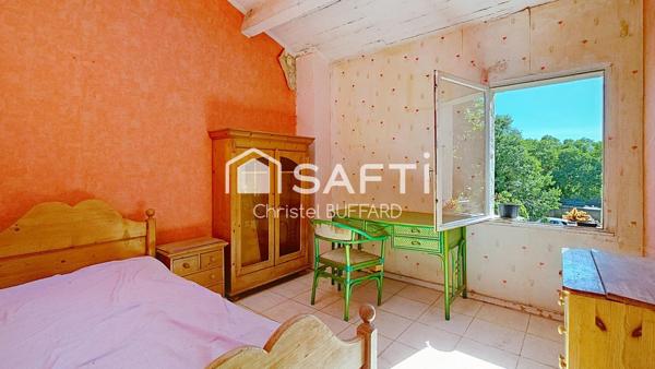 Petit immeuble à fort potentiel avec terrain constructible