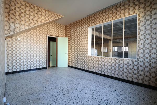 Appartement à réhabiliter - 109 m² en RDC