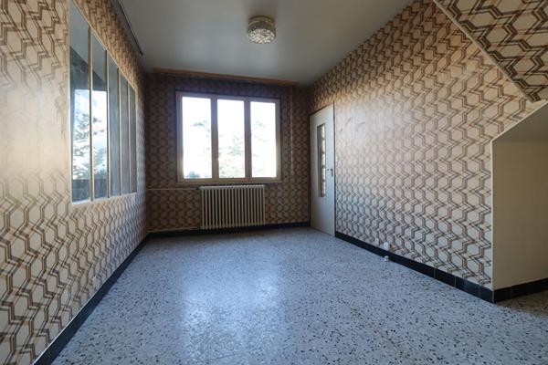 Appartement à réhabiliter - 109 m² en RDC