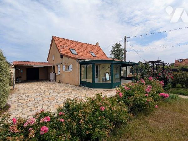 Maison avec jardin à la campagne