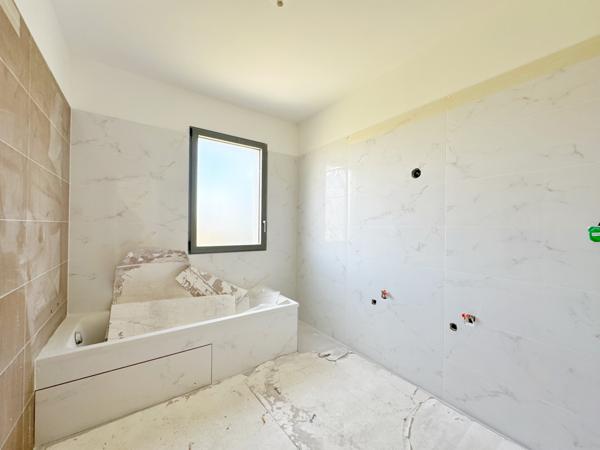 Maison neuve de 116 m23 sur une parcelle de 816 m2